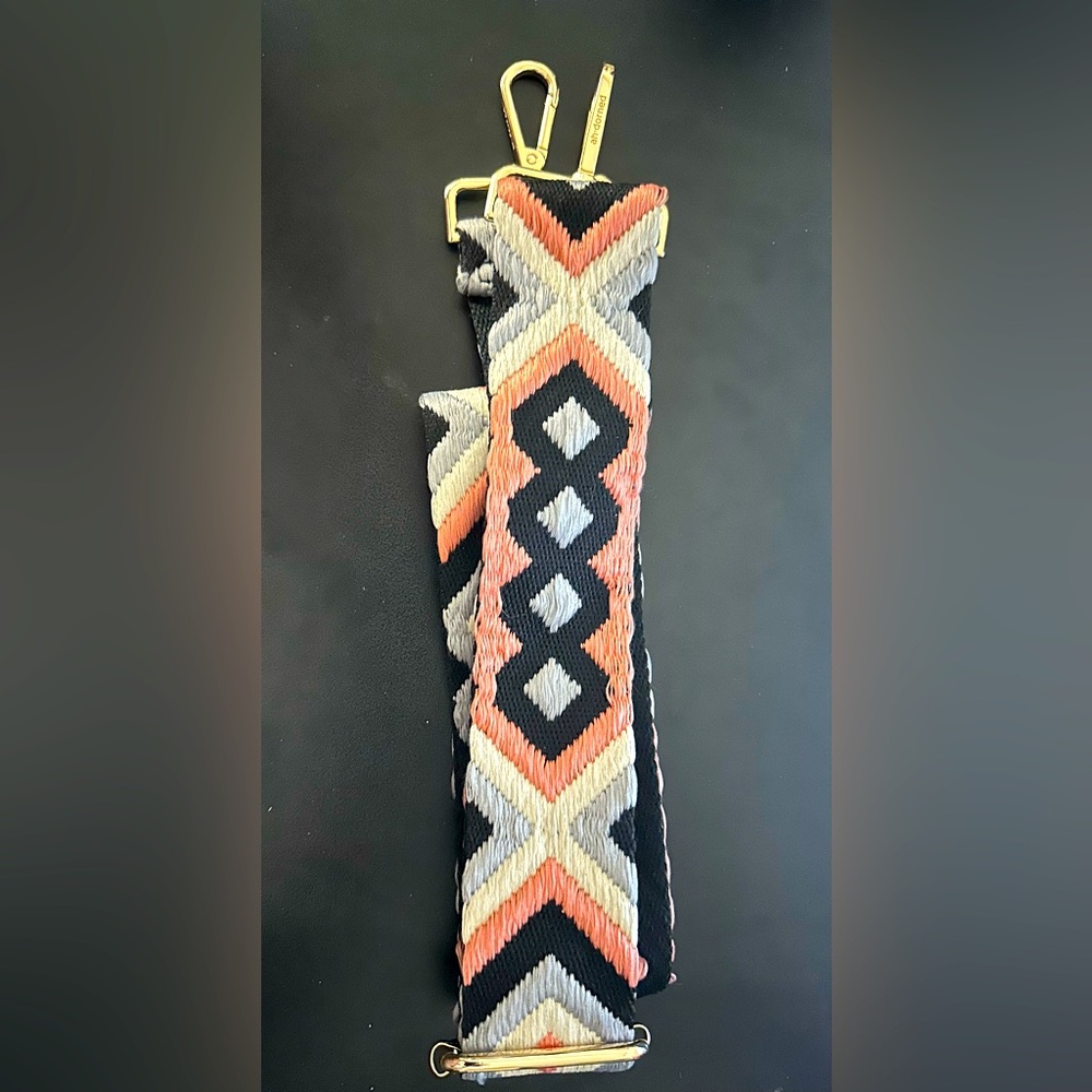 Ah-dorned crossbody strap. Boho geo print.